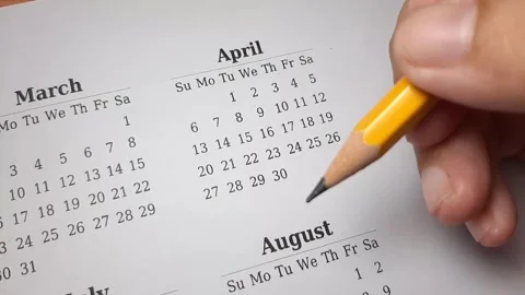 Marking april date on the calendar Video stock 296143640