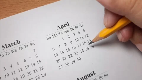 Marking april date on the calendar Video stock 296143641