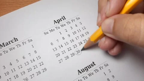 Marking april date on the calendar Video stock 296143648
