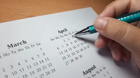 Marking april date on the calendar Video stock 296143662