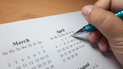 Marking april date on the calendar Video stock 296143666