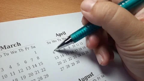 Marking april date on the calendar Video stock 296143669