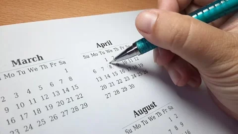 Marking april date on the calendar Video stock 296143672