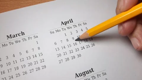 Marking april date on the calendar Video stock 296143683