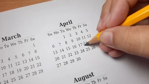 Marking april date on the calendar Video stock 296143684