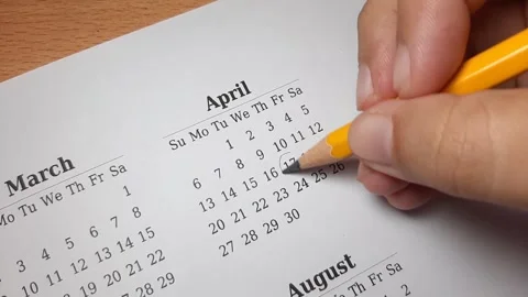Marking april date on the calendar Video stock 296143685