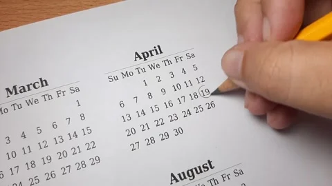 Marking april date on the calendar Video stock 296143688