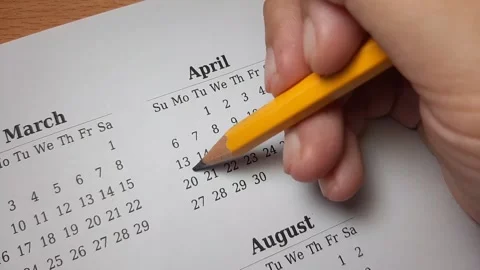 Marking april date on the calendar Video stock 296143690