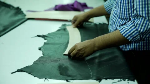 Marking black raw leather manufacturing in factory Stock Footage 202461716