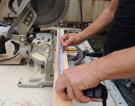 Marking a board before sawing Stock Photos