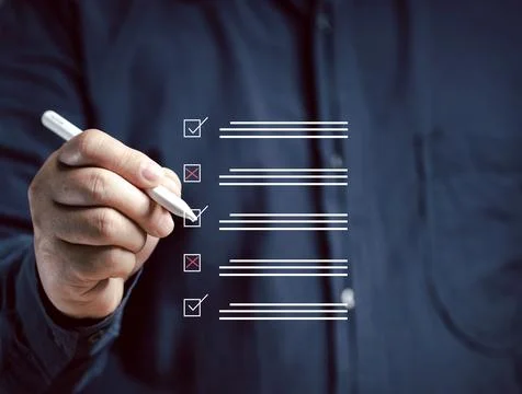 Marking on checklist box isolated on virtual screen. Checklist concept. Han.. Stock Photos