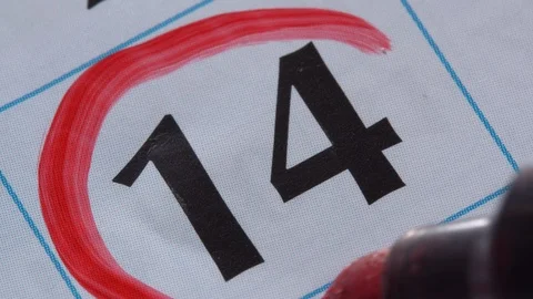 Marking the date in the calendar with a red marker Stock Footage 99295669