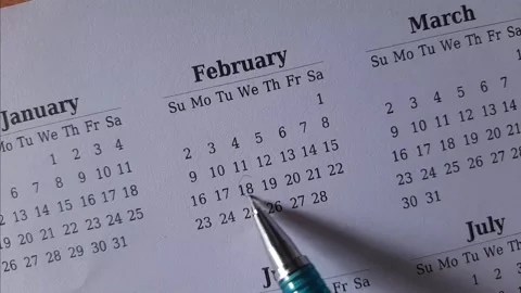 Marking February date on the calendar Stock Footage 295470545