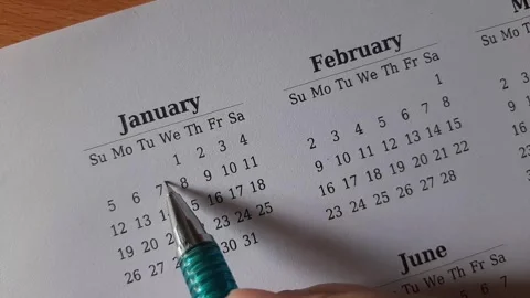 Marking January date on the calendar Stock Footage 295469523