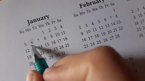 Marking January date on the calendar Stock Footage 295469531