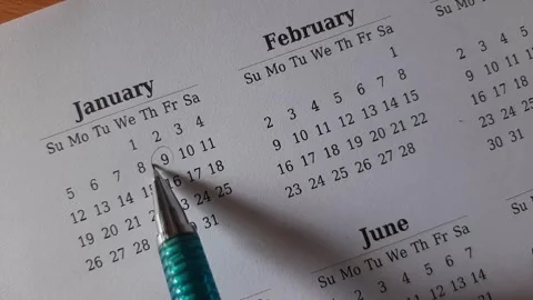Marking January date on the calendar Stock Footage 295469626