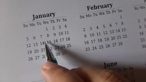 Marking January date on the calendar Stock Footage 295469716