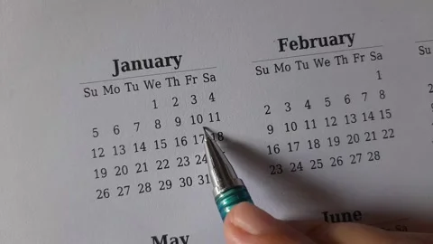Marking January date on the calendar Stock Footage 295469819
