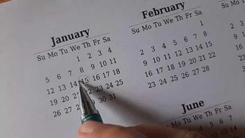 Marking January date on the calendar Stock Footage 295469827