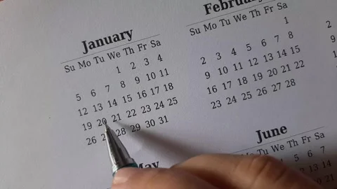 Marking January date on the calendar Stock Footage 295469858