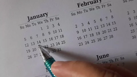 Marking January date on the calendar Stock Footage 295469859