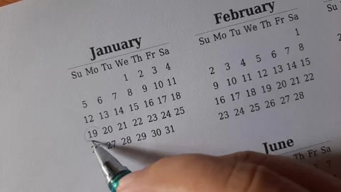 Marking January date on the calendar Stock Footage 295469869