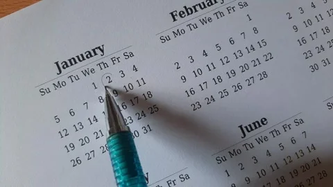 Marking January date on the calendar Stock Footage 295470042
