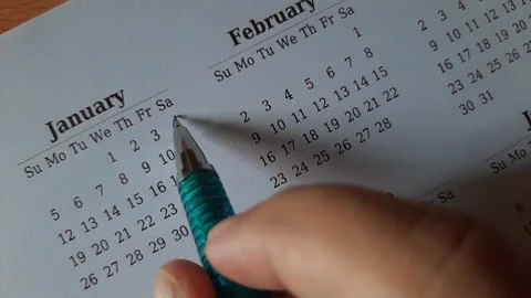 Marking January date on the calendar Stock Footage 295470048