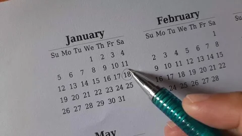 Marking January date on the calendar Stock Footage 295470125