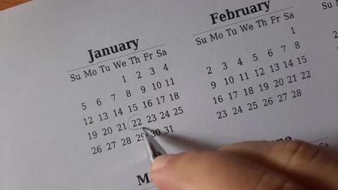 Marking January date on the calendar Stock Footage 295470231