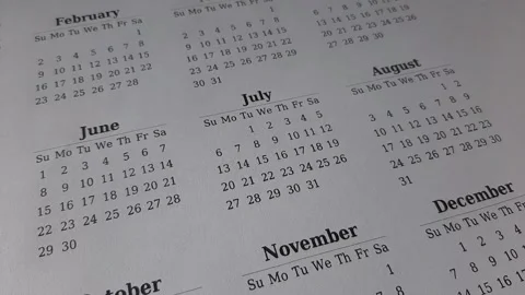 Marking July date on the calendar Stock Footage 311437673