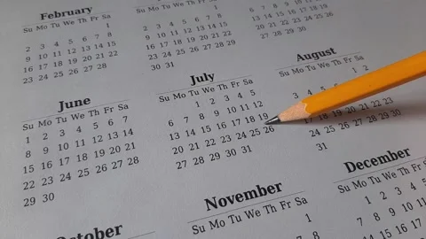 Marking July date on the calendar Stock Footage 311439338