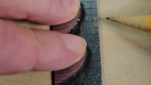 Marking a line on a board Stock Footage 138956422