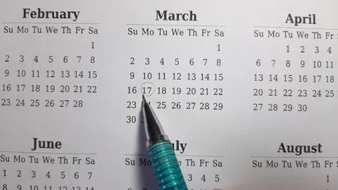 Marking march date on the calendar Stock Footage 296143526