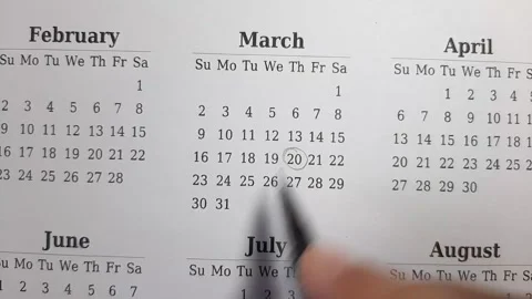 Marking march date on the calendar Stock Footage 296143531