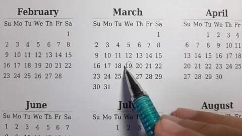 Marking march date on the calendar Stock Footage 296143532