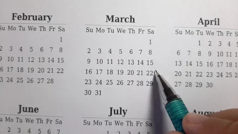 Marking march date on the calendar Stock Footage 296143538