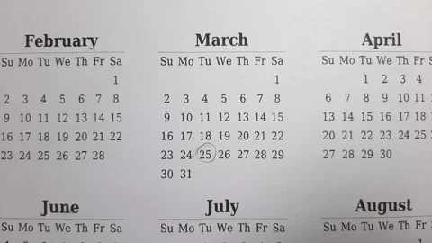 Marking march date on the calendar Stock Footage 296143539