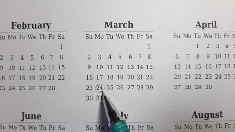 Marking march date on the calendar Stock Footage 296143540