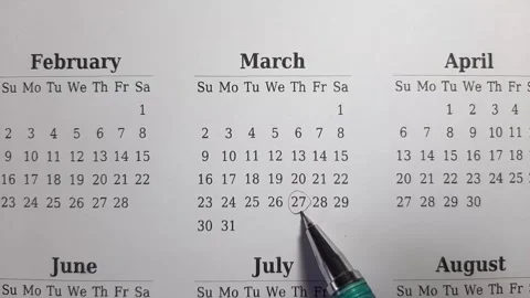 Marking march date on the calendar Stock Footage 296143542