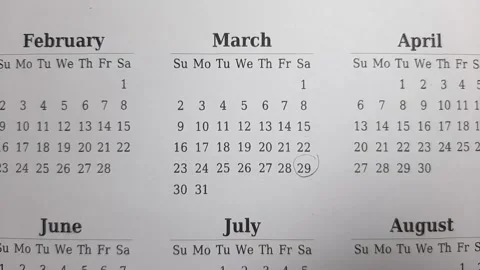 Marking march date on the calendar Stock Footage 296143544