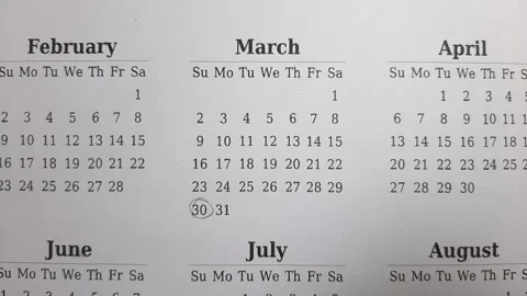 Marking march date on the calendar Stock Footage 296143548