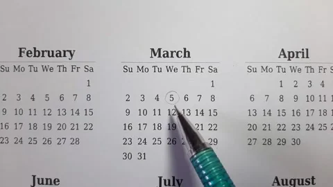 Marking march date on the calendar Stock Footage 296143558