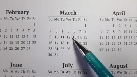 Marking march date on the calendar Video stock 296143567