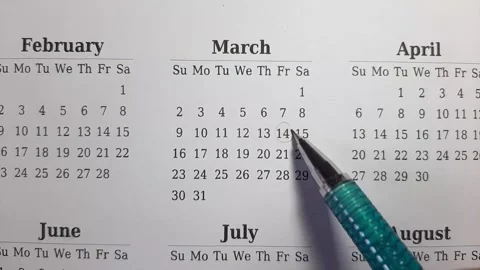 Marking march date on the calendar Video stock 296143568