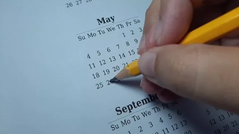Marking the may 26 date on the calendar Stock Footage 303991842
