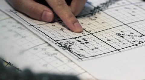 Marking off petroleum wells on chart Stock Footage 8360160