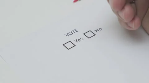 Marking with a red yes marker on vote form Stock Footage 279025215