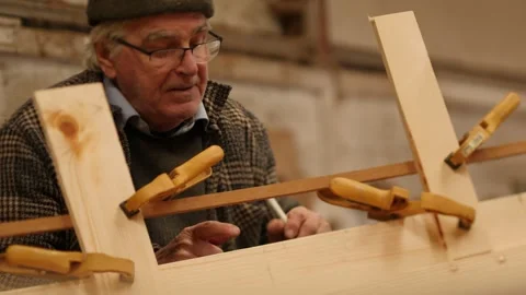 Marking reference on wood boat using tape measure Video stock 302523099