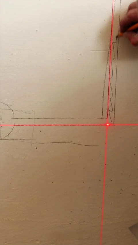 Marking specific area on wall for conduit channeling vertical Stock Footage 339298220